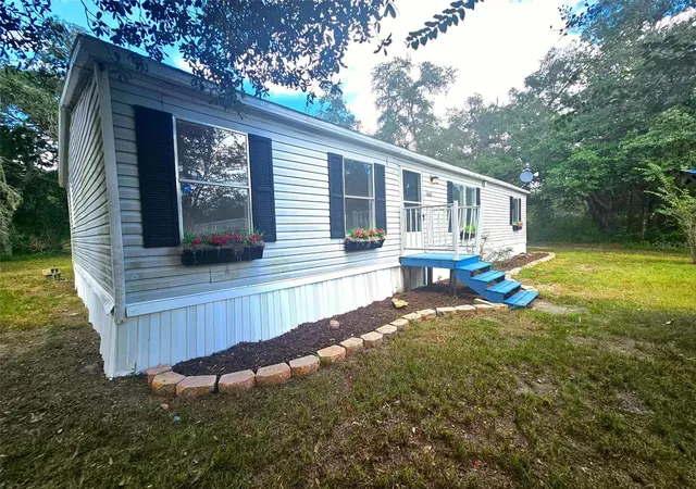 Photo 1 of Manufactured home for sale at 9485 Rousseau St, Webster, FL 33597 | MLS# O6444257 | Listing updated on 2026-09-29