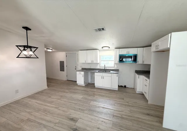 Photo 4 of Manufactured home for sale at 9485 Rousseau St, Webster, FL 33597 | MLS# O6444257 | Listing updated on 2026-09-29