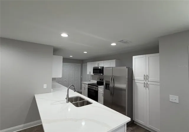Photo 2 of Single family home for sale at 1313 Fairfax St NE, Winter Haven, FL 33881 | MLS# P4939982 | Listing updated on 2026-09-30