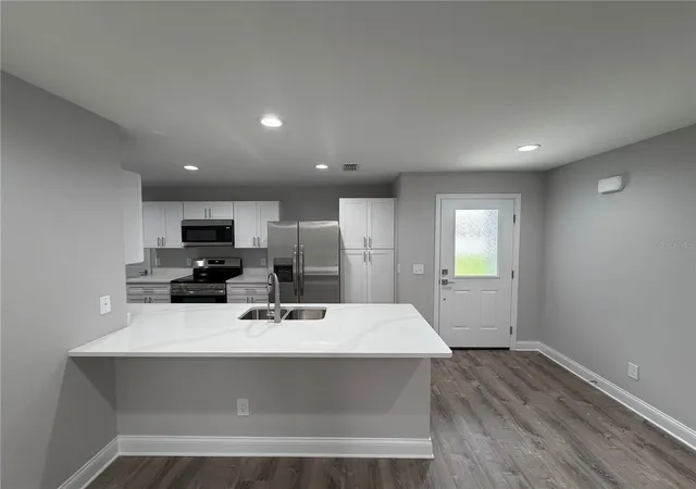 Photo 3 of Single family home for sale at 1313 Fairfax St NE, Winter Haven, FL 33881 | MLS# P4939982 | Listing updated on 2026-09-30