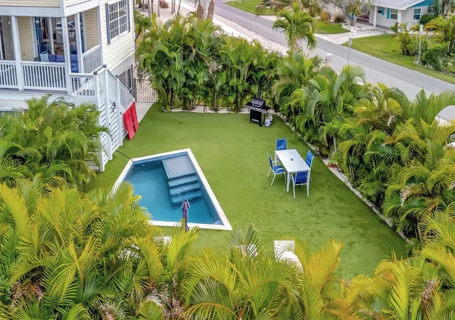 Photo 3 of Single family home for sale at 303 58th Street, Holmes Beach, FL 34217 | MLS# A4707191 | Listing updated on 2026-10-04