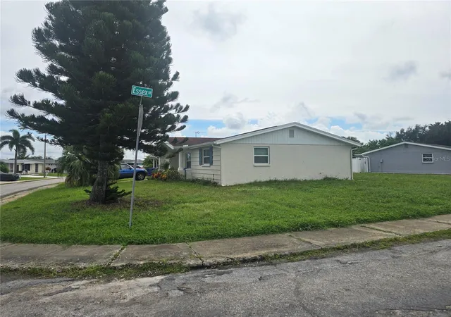 Photo 2 of Single family home for sale at 2055 Norfolk Dr, Holiday, FL 34691 | MLS# TB8551580 | Listing updated on 2026-10-07