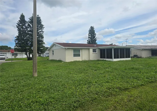 Photo 3 of Single family home for sale at 2055 Norfolk Dr, Holiday, FL 34691 | MLS# TB8551580 | Listing updated on 2026-10-07