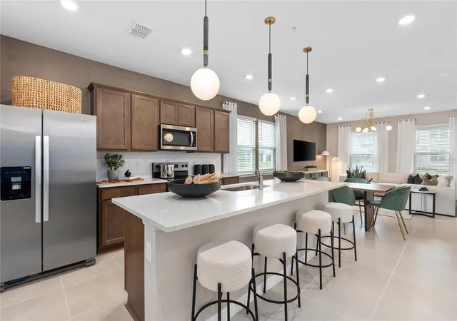 Photo 3 of Townhouse for sale at 7872 Emerald Palm Point, Orlando, FL 32829 | MLS# O6444296 | Listing updated on 2026-09-24