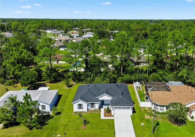 Photo 1 of Single family home for sale at 50 Wheeling Ln, Palm Coast, FL 32164 | MLS# FC321665 | Listing updated on 2026-10-06