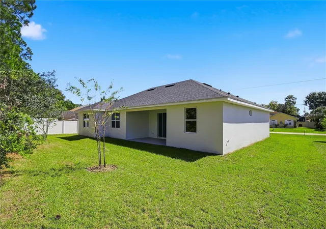 Photo 3 of Single family home for sale at 50 Wheeling Ln, Palm Coast, FL 32164 | MLS# FC321665 | Listing updated on 2026-10-06