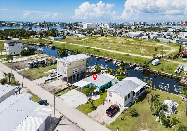Photo 1 of Single family home for sale at 847 Oak St, Fort Myers Beach, FL 33931 | MLS# TB8551639 | Listing updated on 2026-09-24