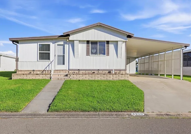 Photo 1 of Manufactured home for sale at 4320 13th Street E, Ellenton, FL 34222 | MLS# A4707211 | Listing updated on 2026-09-24