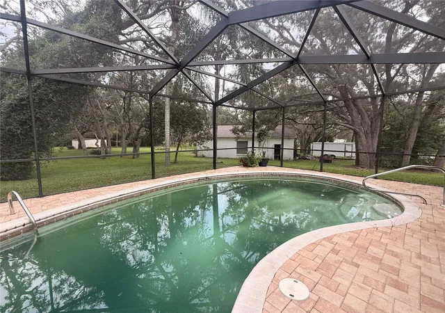 Photo 3 of Single family home for sale at 18618 Anglewood Dr, Hudson, FL 34667 | MLS# W7889775 | Listing updated on 2026-10-03