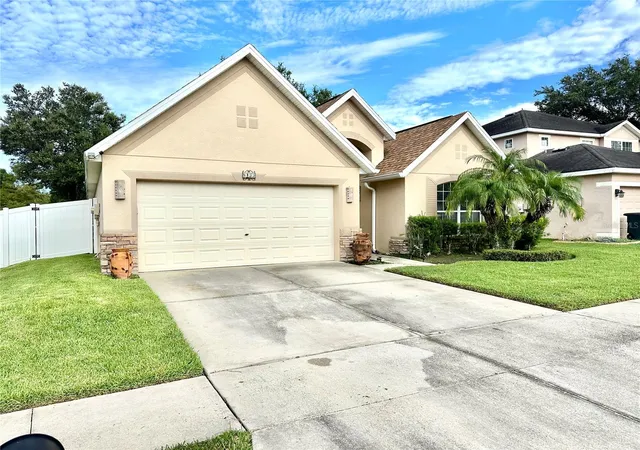 Photo 2 of Single family home for sale at 6135 Champions Gate Blvd, Zephyrhills, FL 33541 | MLS# TB8551696 | Listing updated on 2026-10-04