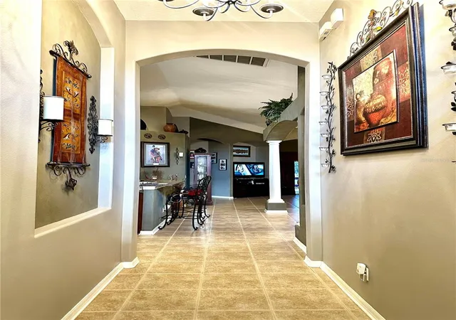 Photo 3 of Single family home for sale at 6135 Champions Gate Blvd, Zephyrhills, FL 33541 | MLS# TB8551696 | Listing updated on 2026-10-04