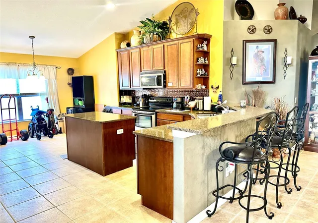 Photo 4 of Single family home for sale at 6135 Champions Gate Blvd, Zephyrhills, FL 33541 | MLS# TB8551696 | Listing updated on 2026-10-04