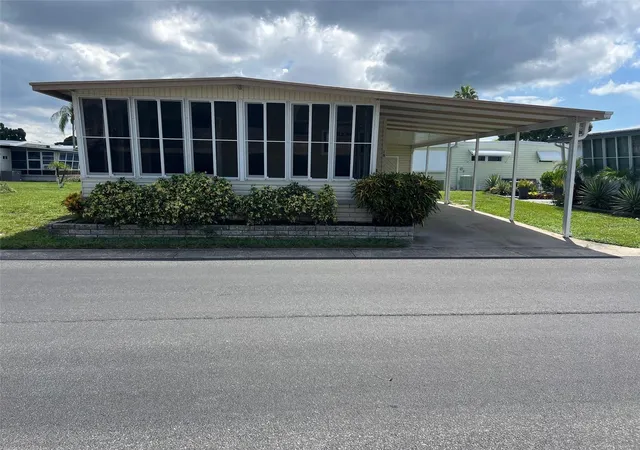 Photo 1 of Manufactured home for sale at 19 Pindo Palm St W, Largo, FL 33770 | MLS# TB8551699 | Listing updated on 2026-09-24