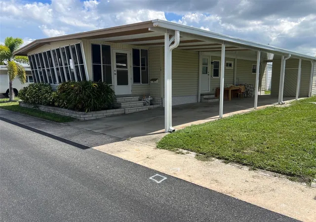 Photo 2 of Manufactured home for sale at 19 Pindo Palm St W, Largo, FL 33770 | MLS# TB8551699 | Listing updated on 2026-09-24