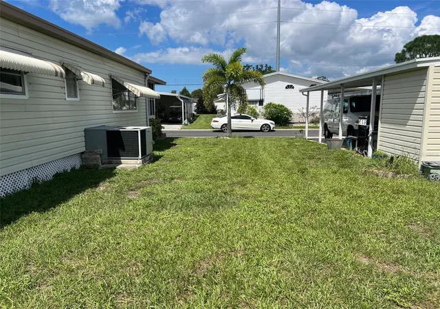 Photo 4 of Manufactured home for sale at 19 Pindo Palm St W, Largo, FL 33770 | MLS# TB8551699 | Listing updated on 2026-09-24