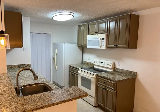 Photo 3 of Condo for sale at 2101 Cascades Blvd #106, Kissimmee, FL 34741 | MLS# S5158213 | Listing updated on 2026-09-24