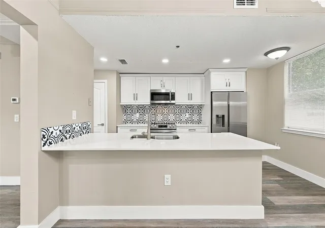 Photo 4 of Townhouse for sale at 12020 Villanova Dr #107, Orlando, FL 32837 | MLS# S5158214 | Listing updated on 2026-09-26