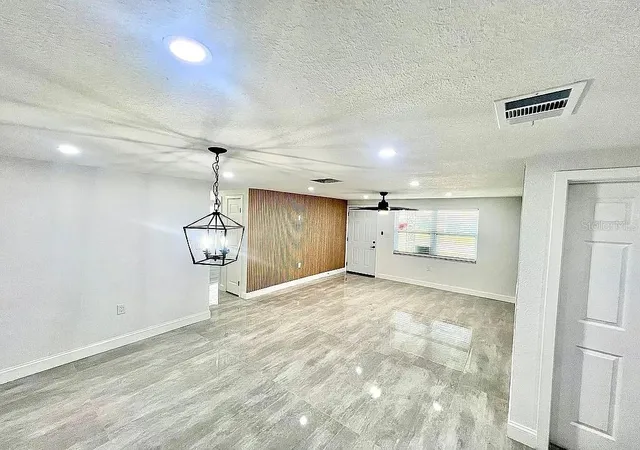 Photo 4 of Single family home for sale at 3215 Kilburn Rd, Holiday, FL 34691 | MLS# TB8551707 | Listing updated on 2026-10-06
