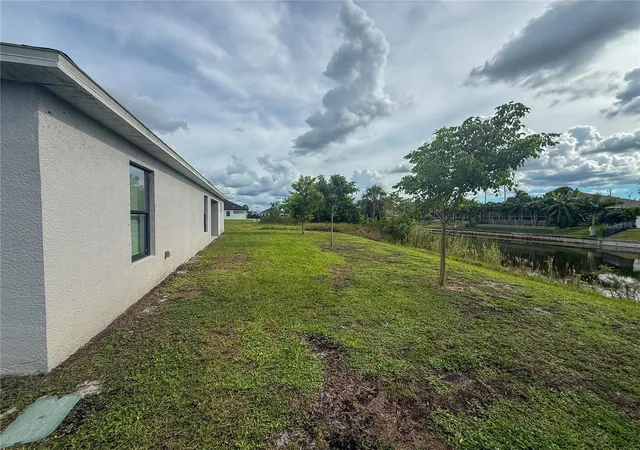 Photo 2 of Single family home for sale at 514 Ne 5th Place, Cape Coral, FL 33909 | MLS# TB8551715 | Listing updated on 2026-10-06