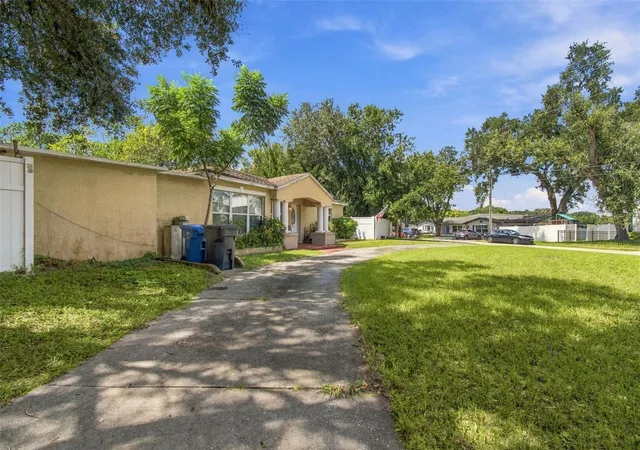 Photo 3 of Single family home for sale at 12408 N Boulevard, Tampa, FL 33612 | MLS# TB8551727 | Listing updated on 2026-10-07