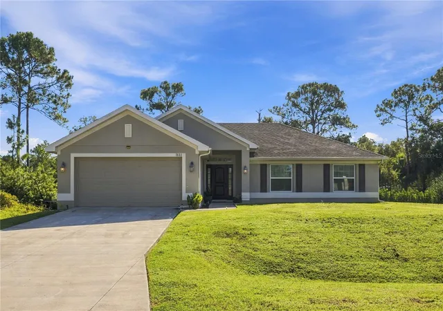 Photo 1 of Single family home for sale at 1822 Yoakum St, Lehigh Acres, FL 33972 | MLS# TB8551737 | Listing updated on 2026-09-26