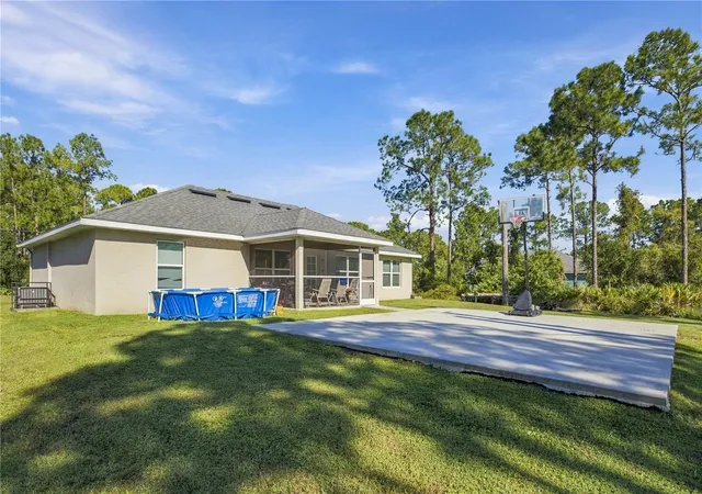 Photo 24 of Single family home for sale at 1822 Yoakum St, LEHIGH ACRES, FL 33972 | MLS# TB8551737 | Listing updated on 2026-10-13