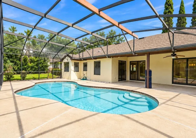 Photo 2 of Single family home for sale at 7201 Moss Leaf Ln, Orlando, FL 32819 | MLS# O6444433 | Listing updated on 2026-10-04