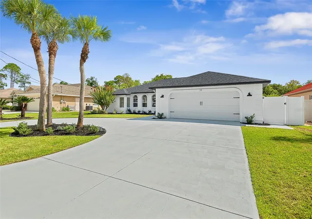 Single family home for sale at 34 Woodhollow Ln, PALM COAST, FL 32164 | MLS# FC321672