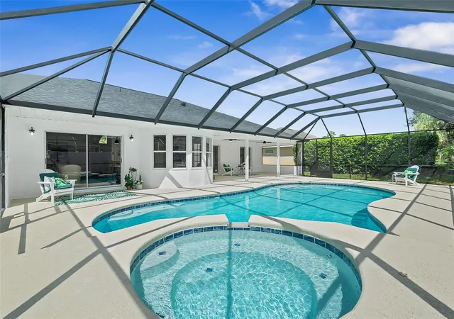 Photo 1 of Single family home for sale at 34 Woodhollow Ln, Palm Coast, FL 32164 | MLS# FC321672 | Listing updated on 2026-09-24