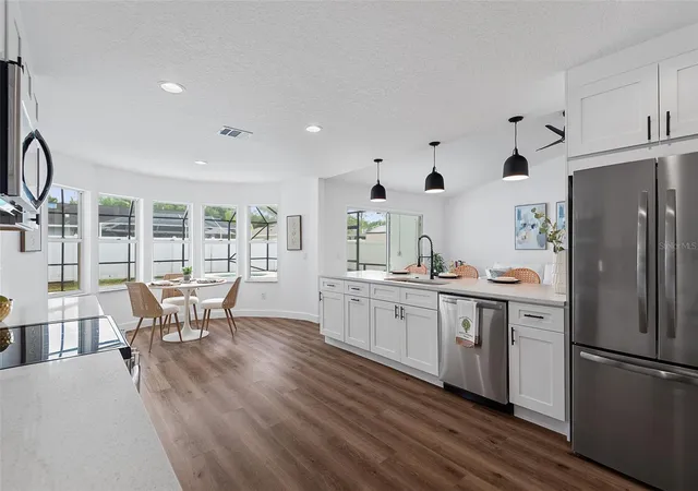 Photo 2 of Single family home for sale at 34 Woodhollow Ln, Palm Coast, FL 32164 | MLS# FC321672 | Listing updated on 2026-09-24