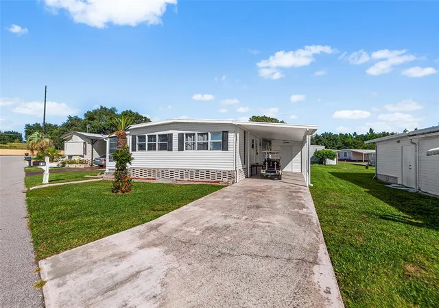 Photo 1 of Manufactured home for sale at 115 Cherrywood Dr, Lake Wales, FL 33898 | MLS# L4965314 | Listing updated on 2026-09-25