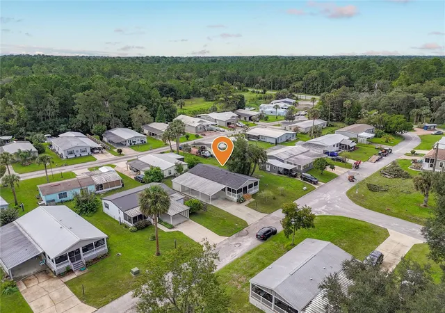 Photo 2 of Manufactured home for sale at 108 Pine Lake Dr, Satsuma, FL 32189 | MLS# O6444510 | Listing updated on 2026-09-27