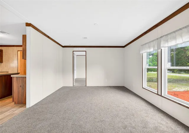 Photo 3 of Manufactured home for sale at 1540 SE 187th Avenue, Silver Springs, FL 34488 | MLS# OM732837 | Listing updated on 2026-09-25