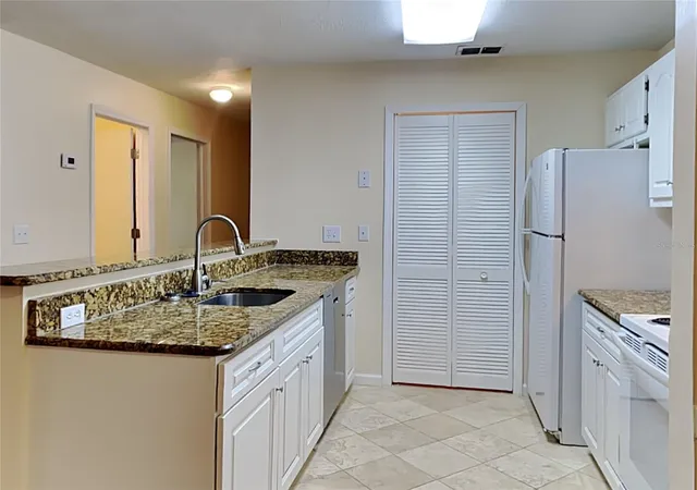 Photo 3 of Condo for sale at 5980 Westgate Dr #103, Orlando, FL 32835 | MLS# O6444530 | Listing updated on 2026-09-26