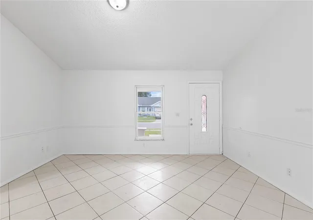 Photo 3 of Single family home for sale at 8221 Autumn Oak Ave, Port Richey, FL 34668 | MLS# TB8551872 | Listing updated on 2026-09-27
