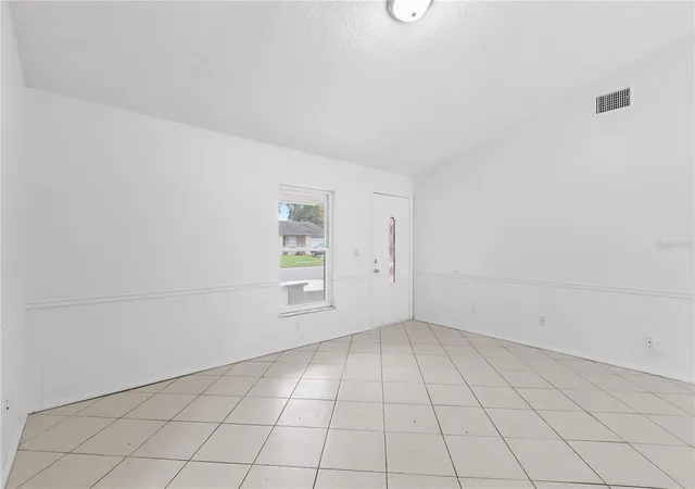 Photo 4 of Single family home for sale at 8221 Autumn Oak Ave, Port Richey, FL 34668 | MLS# TB8551872 | Listing updated on 2026-09-27