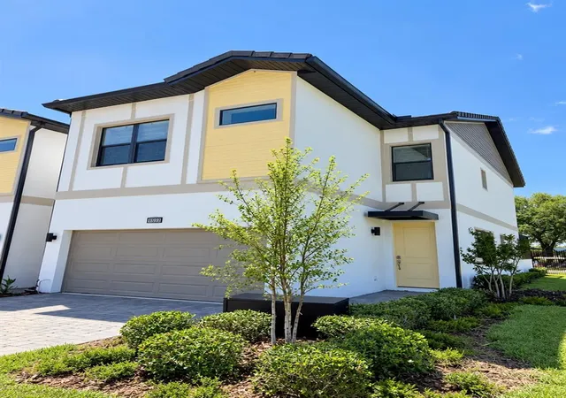 Photo 1 of Townhouse for sale at 10592 Ebb Tide Ln, Orlando, FL 32821 | MLS# O6444567 | Listing updated on 2026-10-08