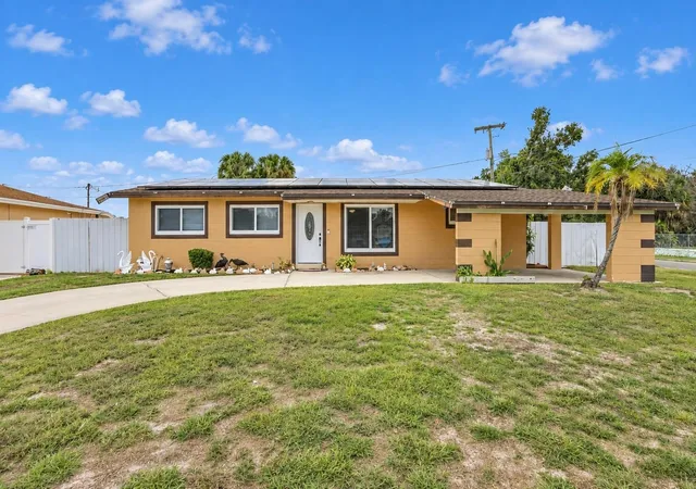 Photo 1 of Single family home for sale at 1201 Julian Ln Dr, Tampa, FL 33619 | MLS# TB8551901 | Listing updated on 2026-10-03