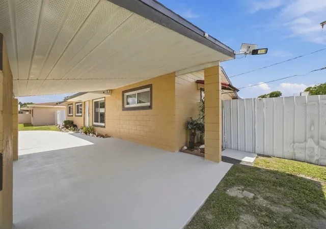 Photo 3 of Single family home for sale at 1201 Julian Ln Dr, Tampa, FL 33619 | MLS# TB8551901 | Listing updated on 2026-10-03