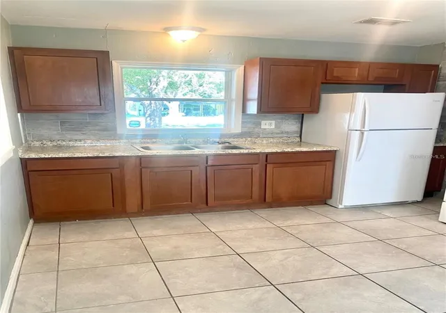 Photo 2 of Single family home for sale at 721 S Clyde Ave, Kissimmee, FL 34741 | MLS# S5158260 | Listing updated on 2026-09-29