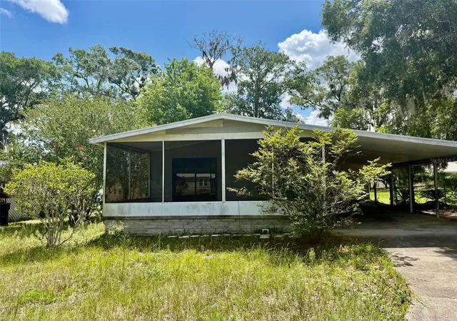 Photo 1 of Manufactured home for sale at 6552 Se 112th Street, Belleview, FL 34420 | MLS# OM732855 | Listing updated on 2026-09-25