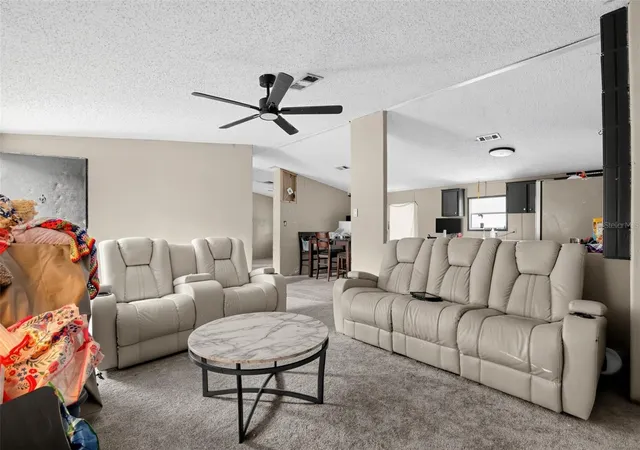 Photo 3 of Manufactured home for sale at 4915 SE 149th Street, Summerfield, FL 34491 | MLS# O6444590 | Listing updated on 2026-09-25
