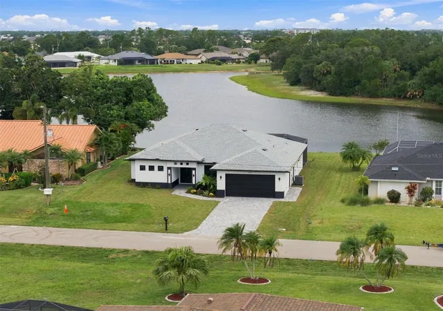 Single family home for sale at 1397 Razorbill Ln SE, PUNTA GORDA, FL 33983 | MLS# O6444593