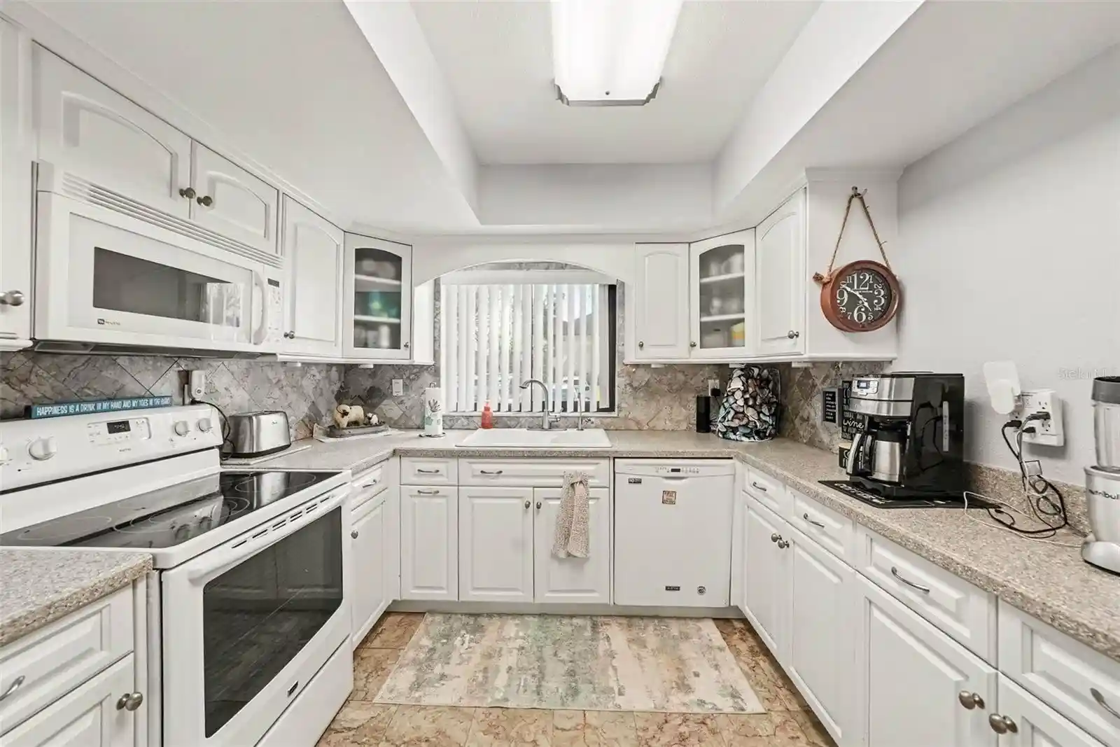 Listing Photo 2 - Condo for sale in 825 S Vlg Dr N located at 825 S Vlg Dr N, St. Petersburg, FL 33716 - Unit #102