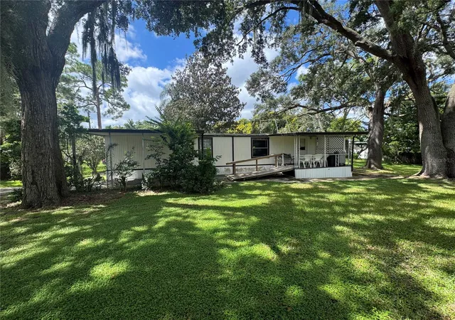 Photo 4 of Manufactured home for sale at 9613 Andy Dr, Hudson, FL 34669 | MLS# W7889811 | Listing updated on 2026-09-25