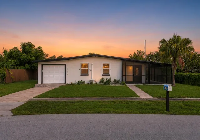 Photo 1 of Single family home for sale at 21058 Meehan Ave, Port Charlotte, FL 33952 | MLS# A4707348 | Listing updated on 2026-10-05