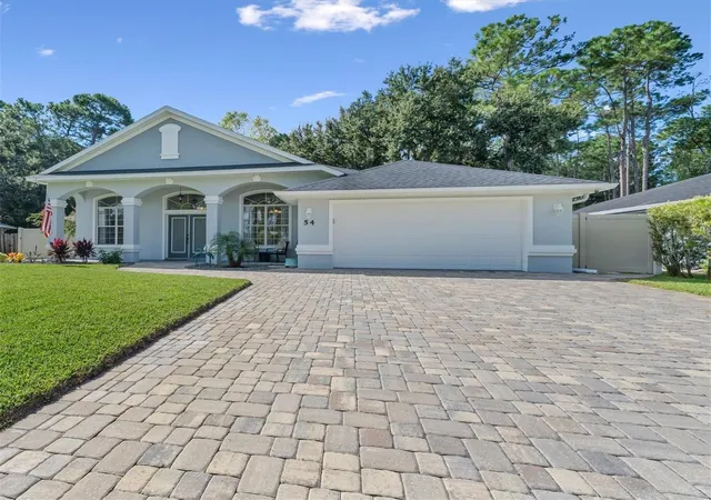 Photo 3 of Single family home for sale at 54 Woodworth Dr, Palm Coast, FL 32164 | MLS# FC321692 | Listing updated on 2026-09-26