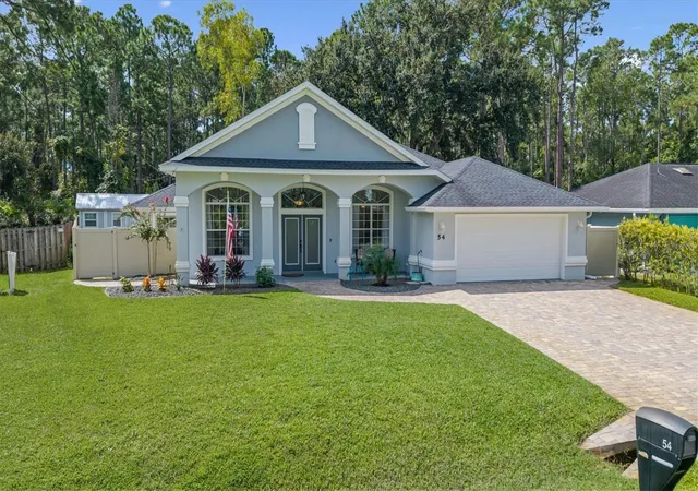 Photo 4 of Single family home for sale at 54 Woodworth Dr, Palm Coast, FL 32164 | MLS# FC321692 | Listing updated on 2026-09-26