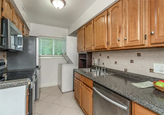 Photo 3 of Townhouse for sale at 501 E Bay Dr #702, Largo, FL 33770 | MLS# TB8552030 | Listing updated on 2026-09-26
