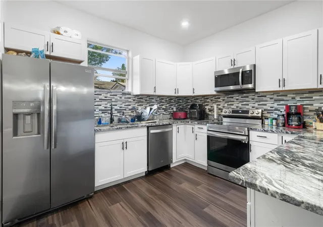 Photo 2 of Single family home for sale at 4411 N Troy St, Tampa, FL 33610 | MLS# TB8552031 | Listing updated on 2026-09-25